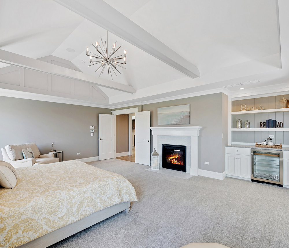 Master bedroom with beige plush carpet in Austin