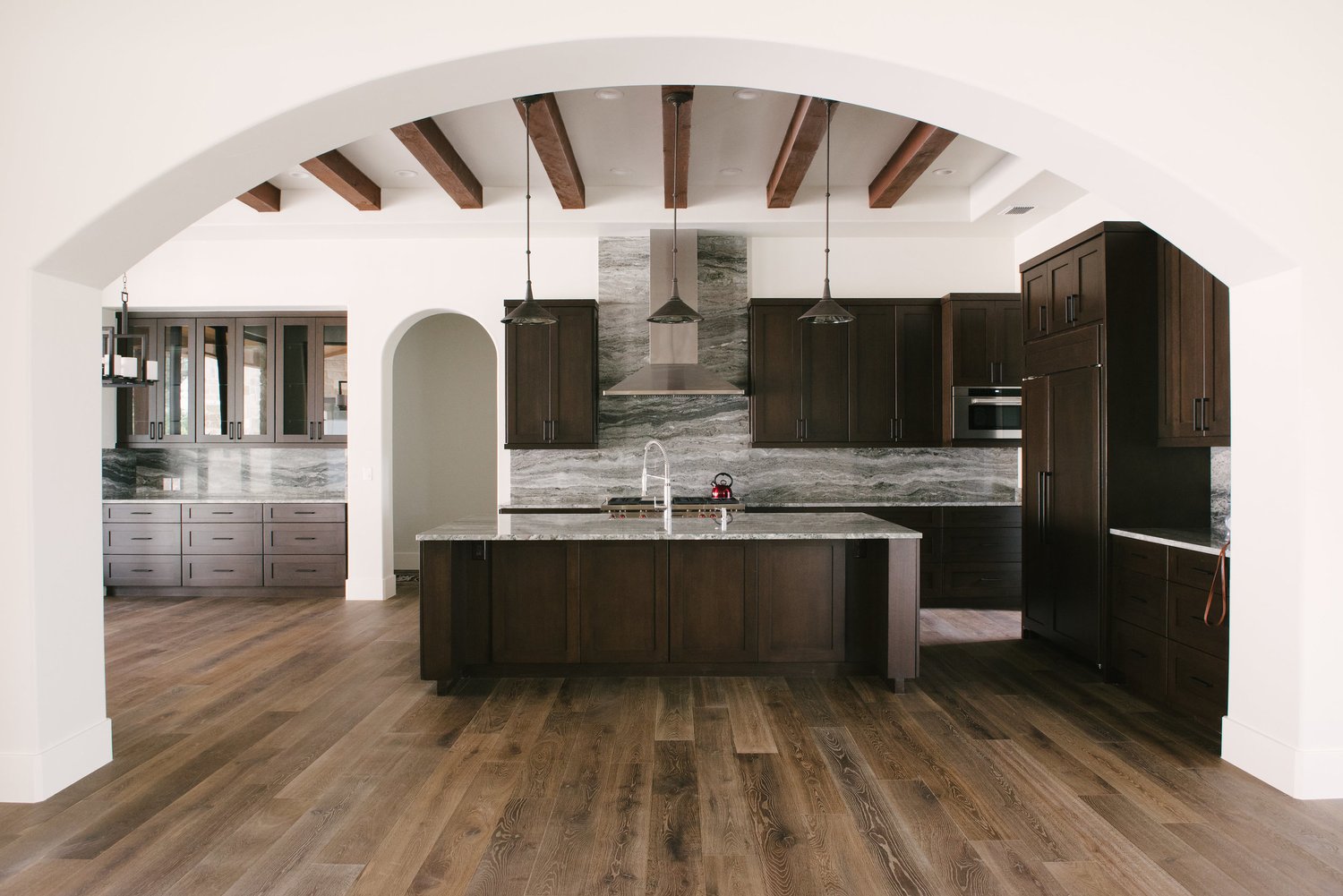 Dark hardwood flooring in modern Austin kitchen