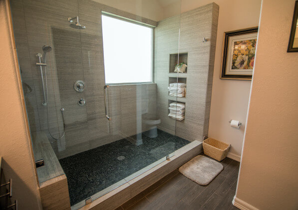 Rustic modern bathroom with walk-in shower in Lakeway