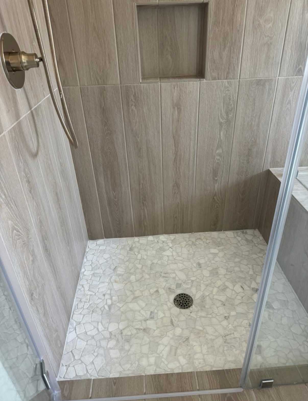 Luxury walk-in shower with frameless glass in Austin