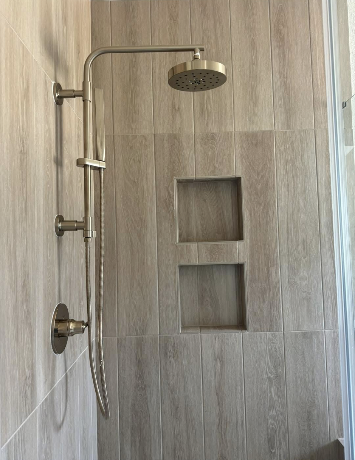 Rustic modern bathroom with walk-in shower in Lakeway